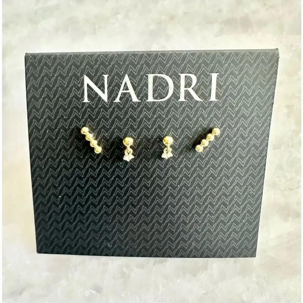 Gold set of two petite Nadri stud earrings ￼